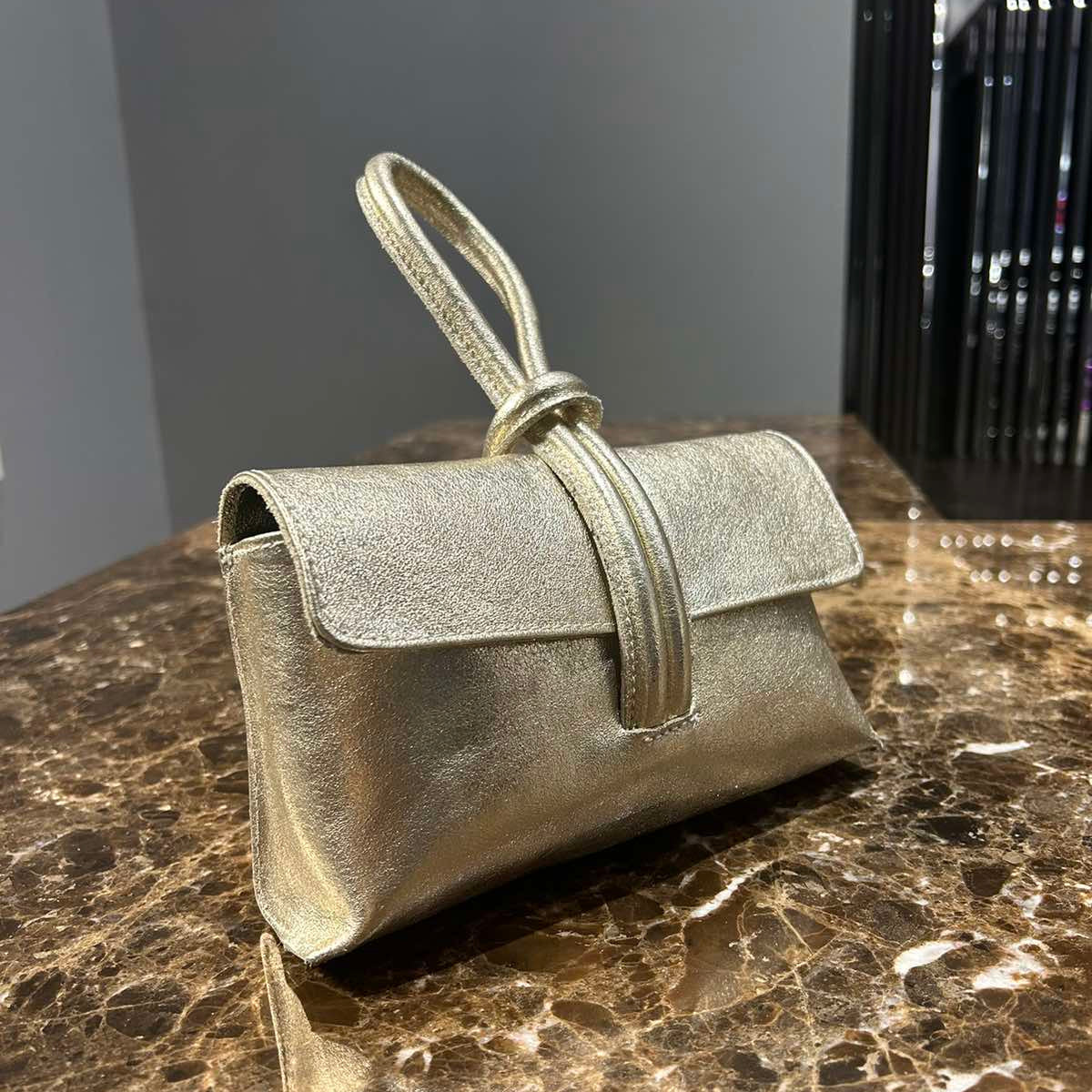 ARTISAN ITALIAN LEATHER LOOP LOCK CLUTCH BAG GOLD